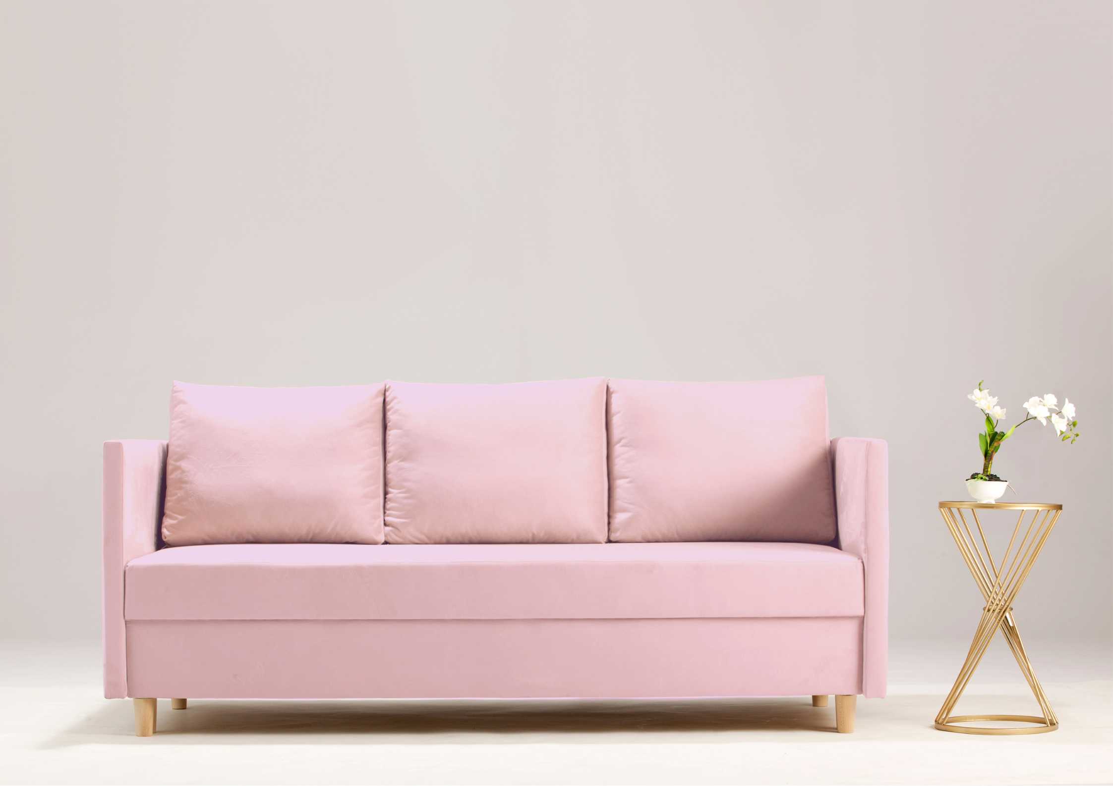 Mała sofa rozkładana w kolorze różowym